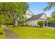 Charming two-story home with well-manicured lawn and attached garage at 2 Pagett St, Daniel Island, SC 29492