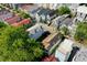 Aerial view of a residential neighborhood with colorful houses and green trees at 20 Felix St, Charleston, SC 29403