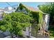Exterior view of a weathered house with vines and trees at 20 Felix St, Charleston, SC 29403