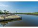 Waterfront dock with benches for relaxation along the tranquil waters of the community at 2009 E Patterson Pt, Hanahan, SC 29410