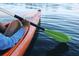 Kayak paddle on the water, with a view of a person enjoying the community water access at 2009 E Patterson Pt, Hanahan, SC 29410