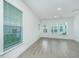 Bright living room with recessed lighting, vinyl floors, and access to a door and backyard at 2009 E Patterson Pt, Hanahan, SC 29410