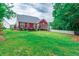 Large backyard lawn with the patio view at 208 Molasses Mill Ct, Summerville, SC 29485