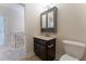 Half bath with dark vanity, modern fixtures, and wood-look flooring, conveniently located upstairs at 208 Molasses Mill Ct, Summerville, SC 29485