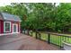 Well-maintained wooden deck features a backyard lawn and access to the house at 208 Molasses Mill Ct, Summerville, SC 29485