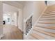 Open hallway with stairway, hardwood floors, and natural light at 208 Molasses Mill Ct, Summerville, SC 29485