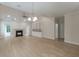 Living room showcasing vaulted ceilings, a cozy fireplace and custom built-in shelving at 208 Molasses Mill Ct, Summerville, SC 29485
