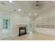 Bright living room featuring fireplace, and built-in bookshelves at 208 Molasses Mill Ct, Summerville, SC 29485