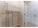 Spacious walk-in closet with wire shelving and carpeted floor at 208 Molasses Mill Ct, Summerville, SC 29485
