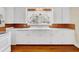 Bright kitchen with white cabinetry, offering a functional and clean cooking space at 210 Padgett Loop, Walterboro, SC 29488