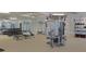 Bright gym with free weights, weight machines, mirrors, and fitness equipment for a complete workout experience at 213 Clearpath Dr, Summerville, SC 29486