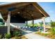 Outdoor pavilion with picnic tables, dining space, and a playground for relaxing and socializing in the community at 213 Clearpath Dr, Summerville, SC 29486