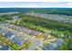 An aerial view of a sprawling suburban neighborhood with lush green trees and well-maintained homes at 219 Whirlaway Dr, Moncks Corner, SC 29461