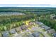 Desirable neighborhood aerial view showcasing a community surrounded by lush trees and a serene atmosphere at 219 Whirlaway Dr, Moncks Corner, SC 29461