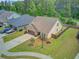 Aerial view of a well kept home featuring a spacious lawn, private fence, and driveway at 219 Whirlaway Dr, Moncks Corner, SC 29461