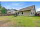 A well maintained backyard with a lawn and fenced area, perfect for outdoor enjoyment at 219 Whirlaway Dr, Moncks Corner, SC 29461