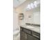Bathroom showcasing granite counters, a round shelf, and a shower/tub combo at 219 Whirlaway Dr, Moncks Corner, SC 29461