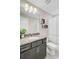 Bathroom featuring a granite vanity, modern decor and shower with patterned curtain at 219 Whirlaway Dr, Moncks Corner, SC 29461