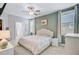 Cozy bedroom with plush carpeting, soft lighting, and a serene color palette at 219 Whirlaway Dr, Moncks Corner, SC 29461