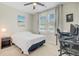 Comfortable bedroom featuring a bed, desk area, natural light, and calming color palette at 219 Whirlaway Dr, Moncks Corner, SC 29461