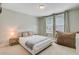 Bedroom with a queen bed, a cozy beanbag chair and lots of natural light at 219 Whirlaway Dr, Moncks Corner, SC 29461