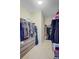 Well-organized walk-in closet offering ample storage and multiple tiers for clothing at 219 Whirlaway Dr, Moncks Corner, SC 29461