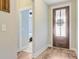Inviting entryway with wood-look floors and views into the home at 219 Whirlaway Dr, Moncks Corner, SC 29461