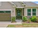 Charming entryway with stone accents and a welcoming front door decor at 219 Whirlaway Dr, Moncks Corner, SC 29461