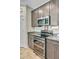 Modern kitchen with stainless steel appliances, granite counters, and sleek cabinetry at 219 Whirlaway Dr, Moncks Corner, SC 29461