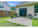 Back patio featuring a sliding glass door, potted plants and partial fencing at 219 Whirlaway Dr, Moncks Corner, SC 29461