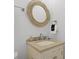 Bathroom vanity features a decorative mirror and stone countertop at 221 Ashley Ave # Abc, Charleston, SC 29403