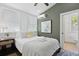 Bedroom with a comfortable bed, dark wood floors, a ceiling fan, and closet for storage at 221 Ashley Ave # Abc, Charleston, SC 29403