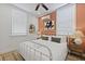 Cozy bedroom with a metal frame bed and natural accents at 221 Ashley Ave # Abc, Charleston, SC 29403