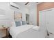 Bright bedroom with a comfortable bed, closet, and a side table, offering a relaxing retreat at 221 Ashley Ave # Abc, Charleston, SC 29403