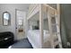 Cozy bunk bed with a white frame is ideal for , plus a relaxing chair nearby at 221 Ashley Ave # Abc, Charleston, SC 29403