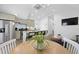 Bright, airy kitchen featuring stainless steel appliances, granite countertops, and a breakfast bar with seating at 221 Ashley Ave # Abc, Charleston, SC 29403