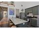 Spacious kitchen with granite countertops, stainless steel appliances, and breakfast bar at 221 Ashley Ave # Abc, Charleston, SC 29403