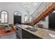 Kitchen flows into living room with granite countertops and stainless appliances at 221 Ashley Ave # Abc, Charleston, SC 29403