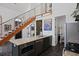 Kitchen island with granite countertops and stainless steel appliances at 221 Ashley Ave # Abc, Charleston, SC 29403