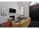Bright living room featuring a fireplace, TV, and comfortable seating at 221 Ashley Ave # Abc, Charleston, SC 29403