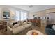 Inviting living room featuring modern kitchen, stylish furniture, and sun-lit windows at 221 Ashley Ave # Abc, Charleston, SC 29403