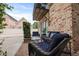 Charming patio featuring cozy seating and a view of lush landscaping and a stylish exterior at 221 Ashley Ave # Abc, Charleston, SC 29403
