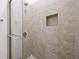 Tiled shower with a glass door and built-in niche at 221 Ashley Ave # Abc, Charleston, SC 29403