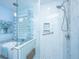 Modern bathroom featuring glass shower with tiled walls and a rain shower head at 23 Forde Row, Charleston, SC 29412