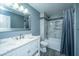 Contemporary bathroom with a shower, marble vanity, and stylish fixtures at 23 Forde Row, Charleston, SC 29412