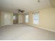 Expansive bedroom with neutral walls, carpeted floors, and a ceiling fan at 23 Forde Row, Charleston, SC 29412