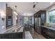 Open kitchen featuring granite counters, dark cabinets, stainless appliances, and an adjacent breakfast nook at 23 Forde Row, Charleston, SC 29412