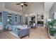 Spacious living room with hardwood floors, vaulted ceilings, and an open layout connecting to the kitchen at 23 Forde Row, Charleston, SC 29412