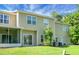 A well manicured backyard with grass and view of the rear of the house at 250 Grand Oaks Dr, Ladson, SC 29456