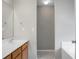 Bright bathroom featuring a large mirror and vanity at 250 Grand Oaks Dr, Ladson, SC 29456